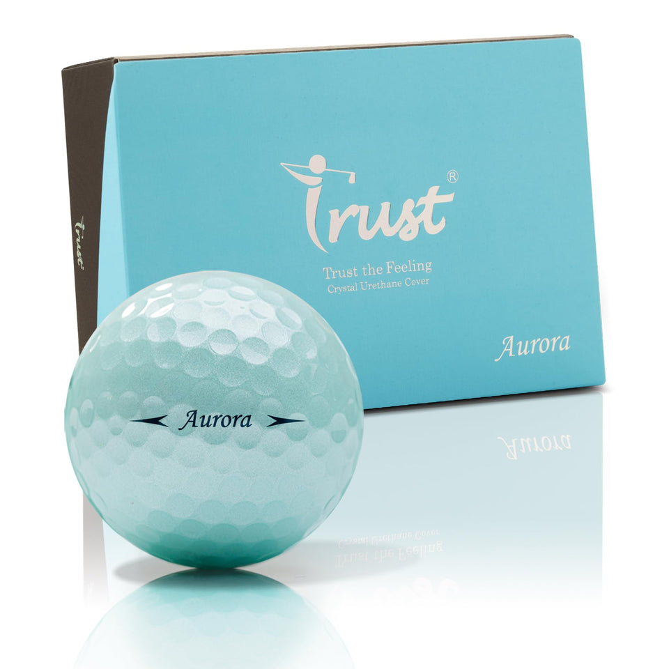 Trust Aurora ICY Blue golf ball front view, high visibility on sunny fairways