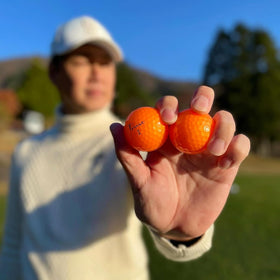 Trust Aurora Bright Orange pack on shelf illustrating 48-ball display