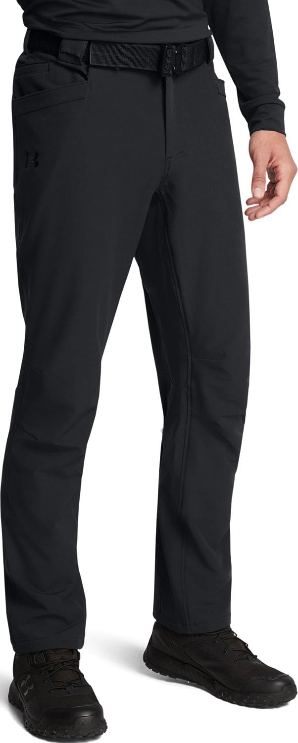 Under Armour Alpha flat front pant in black, front view shows flexible fabric for dynamic activities.