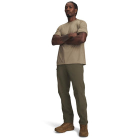 Under Armour Defender pants quick-dry and 4-way stretch in action