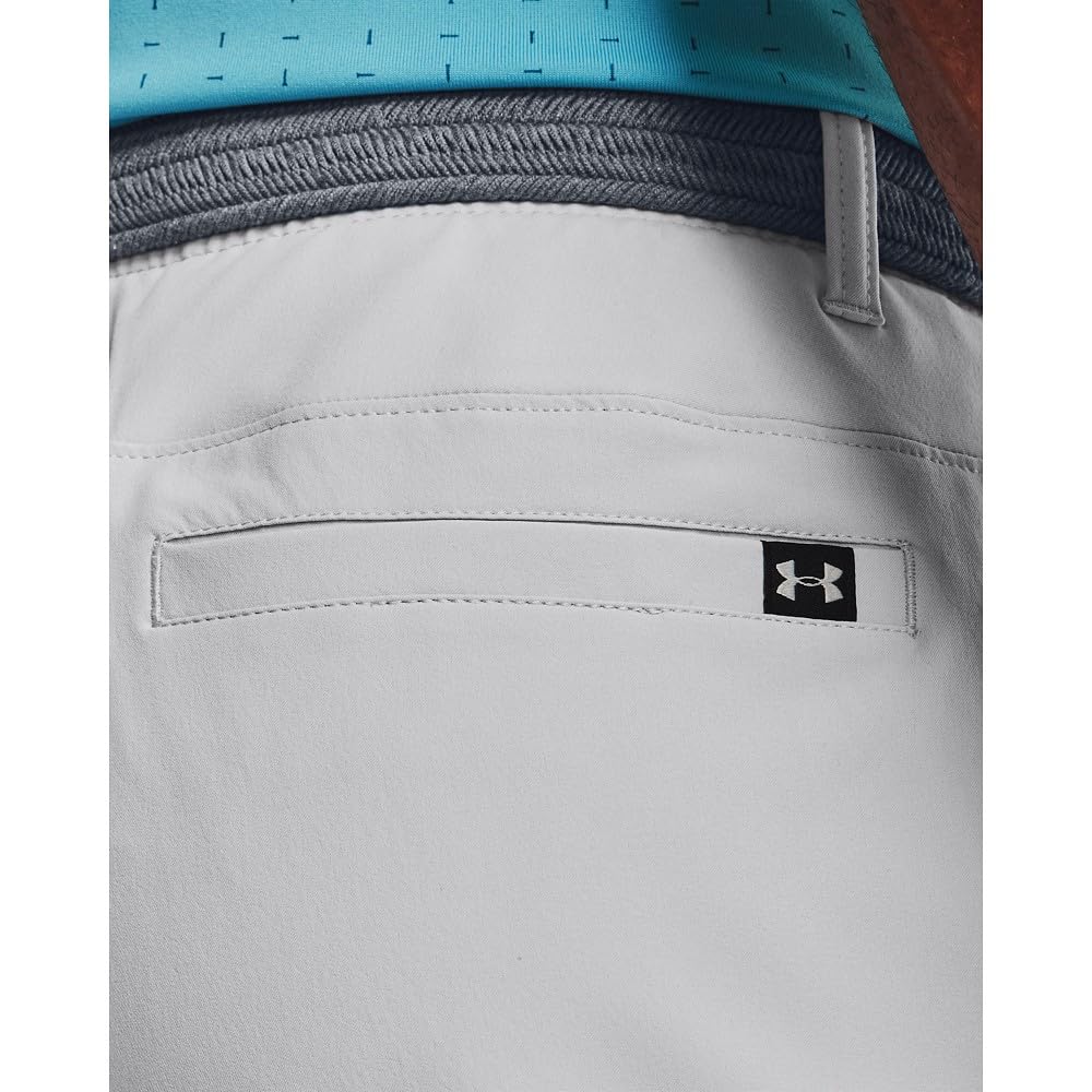 Under Armour Drive Pants fabric microthread texture dries quickly for workouts.