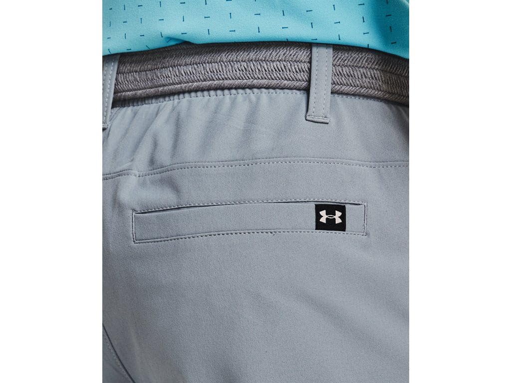 Under Armour Drive pants model wearing demonstrates athletic golf silhouette