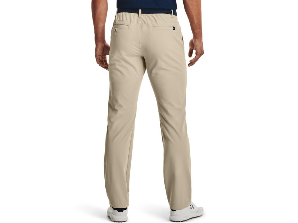 Under Armour Drive Pants side view highlights mobility with 4-way stretch.