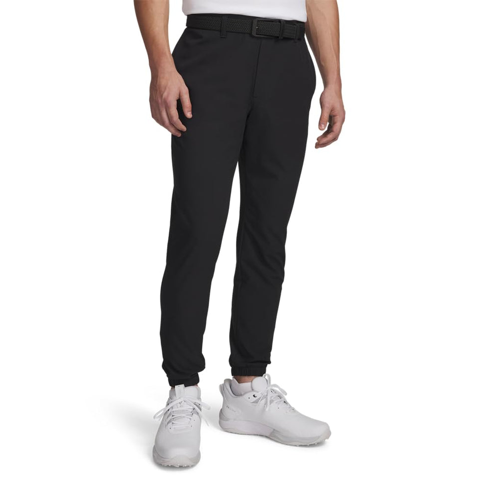 Under Armour men's golf joggers showing flexible mobility for swing-ready comfort.