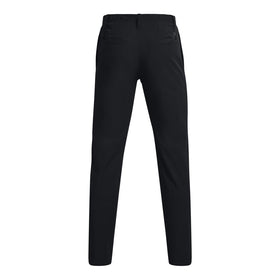 Under Armour men's golf pants black, on-course shot, demonstrates flexible movement during swing.