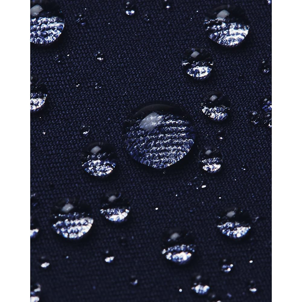 Under Armour golf pants midnight navy, side profile emphasizing tapered fit for range.