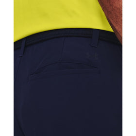 Under Armour pants midnight navy, pocket design for secure storage during play.