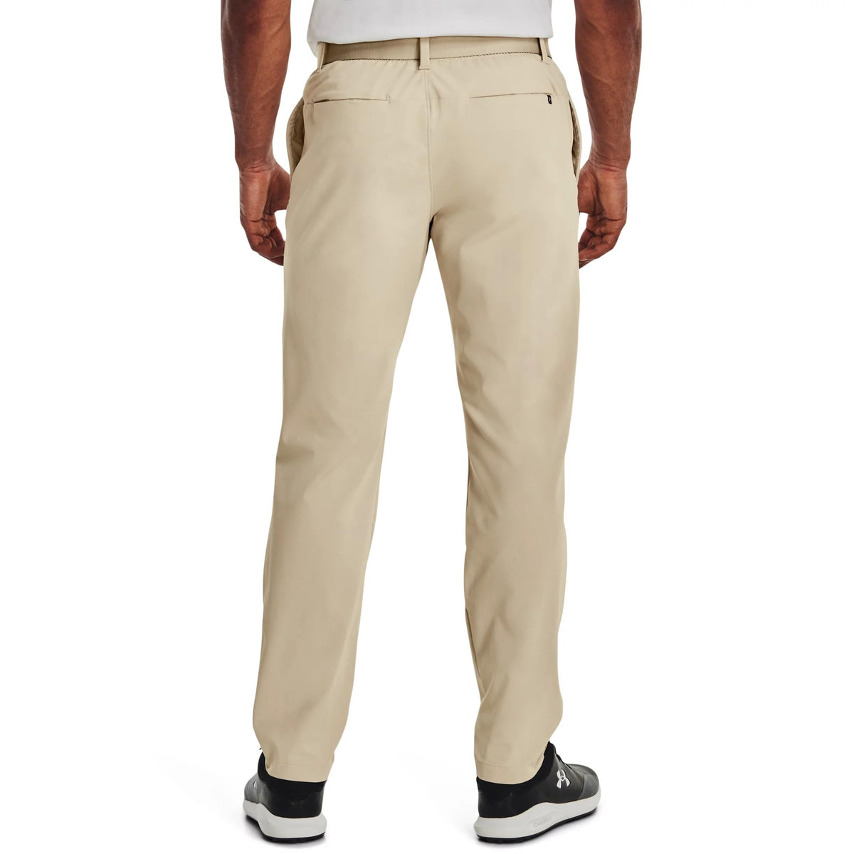 Under Armour Iso-Chill pants side view highlighting tapered fit with flexible, durable fabric.