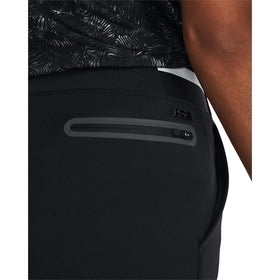 Close-up of Under Armour Links Pull-On Pant fabric showing stretch and wicking properties.