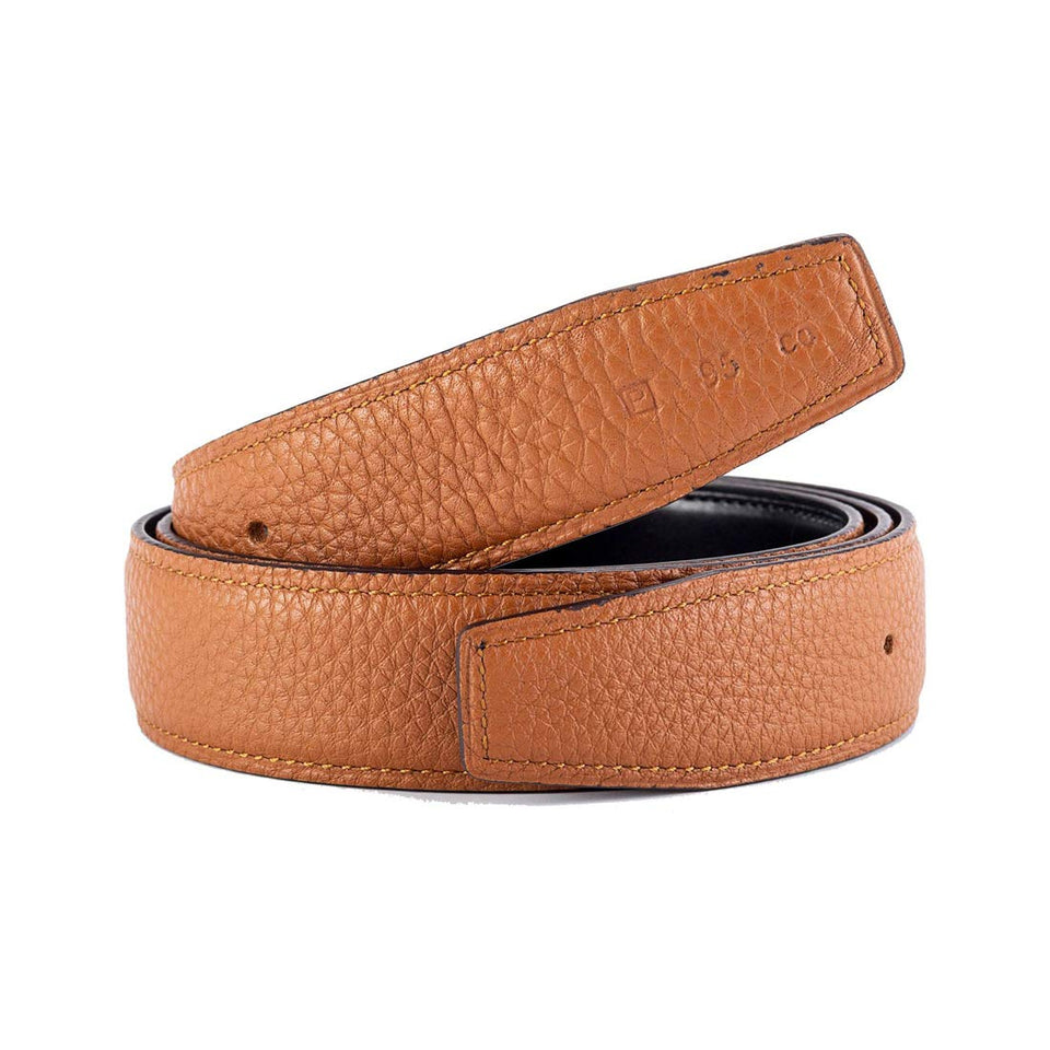 Vatee's belt strap closeup in earth yellow highlights premium leather texture.