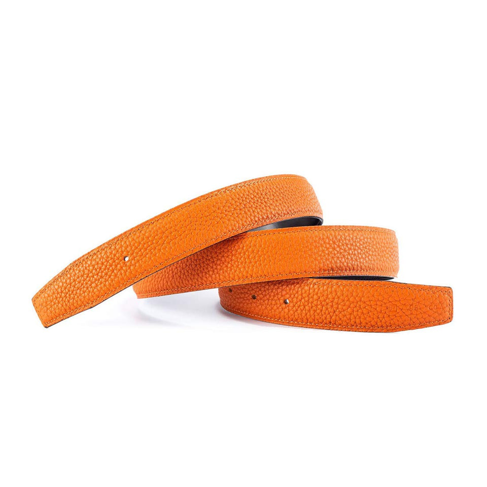Vatee's orange leather belt strap closeup shows premium grain for durability.