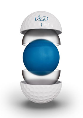 Vice Golf Tour White ball closeup shows dimple pattern for control and greenside feel.