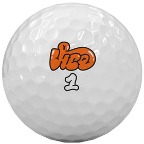 Vice Golf Vice Tour JR ball on green emphasizes forgiving spin for precise approach.