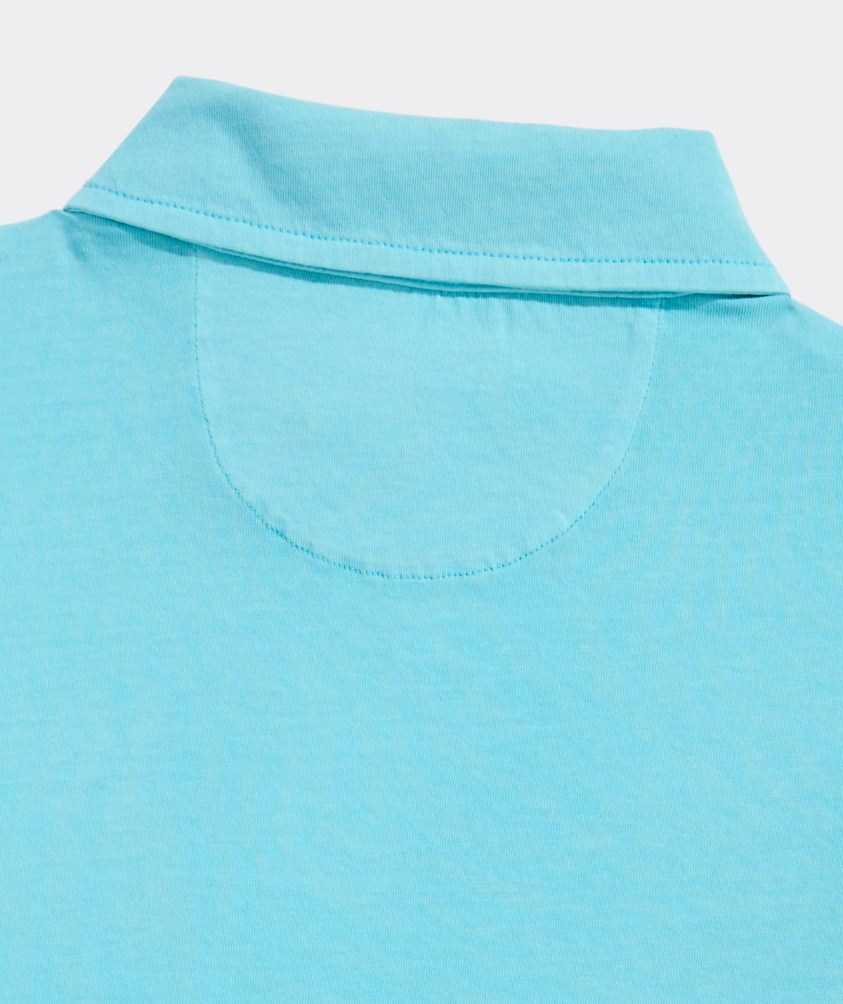 Close-up of fabric texture on Vineyard Vines garment-dyed surf polo