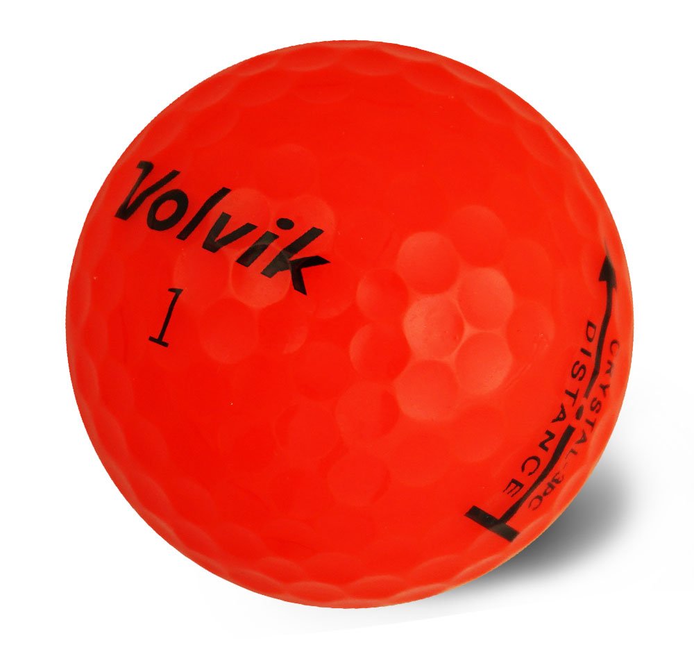 Volvik Crystal golf ball red on green showing stable flight and precise approach.