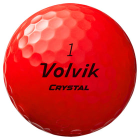 Volvik Crystal Ruby Red golf balls on greens showcase high visibility and straight flight.