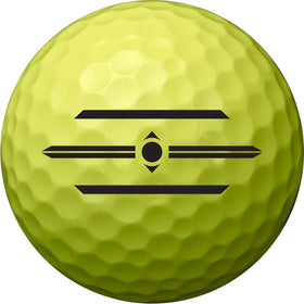 Volvik Magma yellow ball close-up highlighting dual-core construction and color visibility