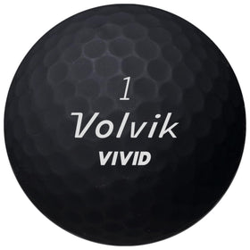 Volvik Vivid matte balls black close-up showing durable coating aids tracking in bright light.