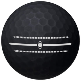 Volvik Vivid matte balls black on green improving visibility and alignment.