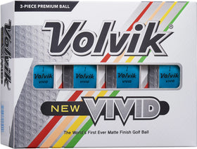 Volvik Vivid matte blue golf ball in flight with high visibility.