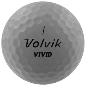 Volvik Vivid matte finish gray golf balls on green, improves focus for accurate shots.