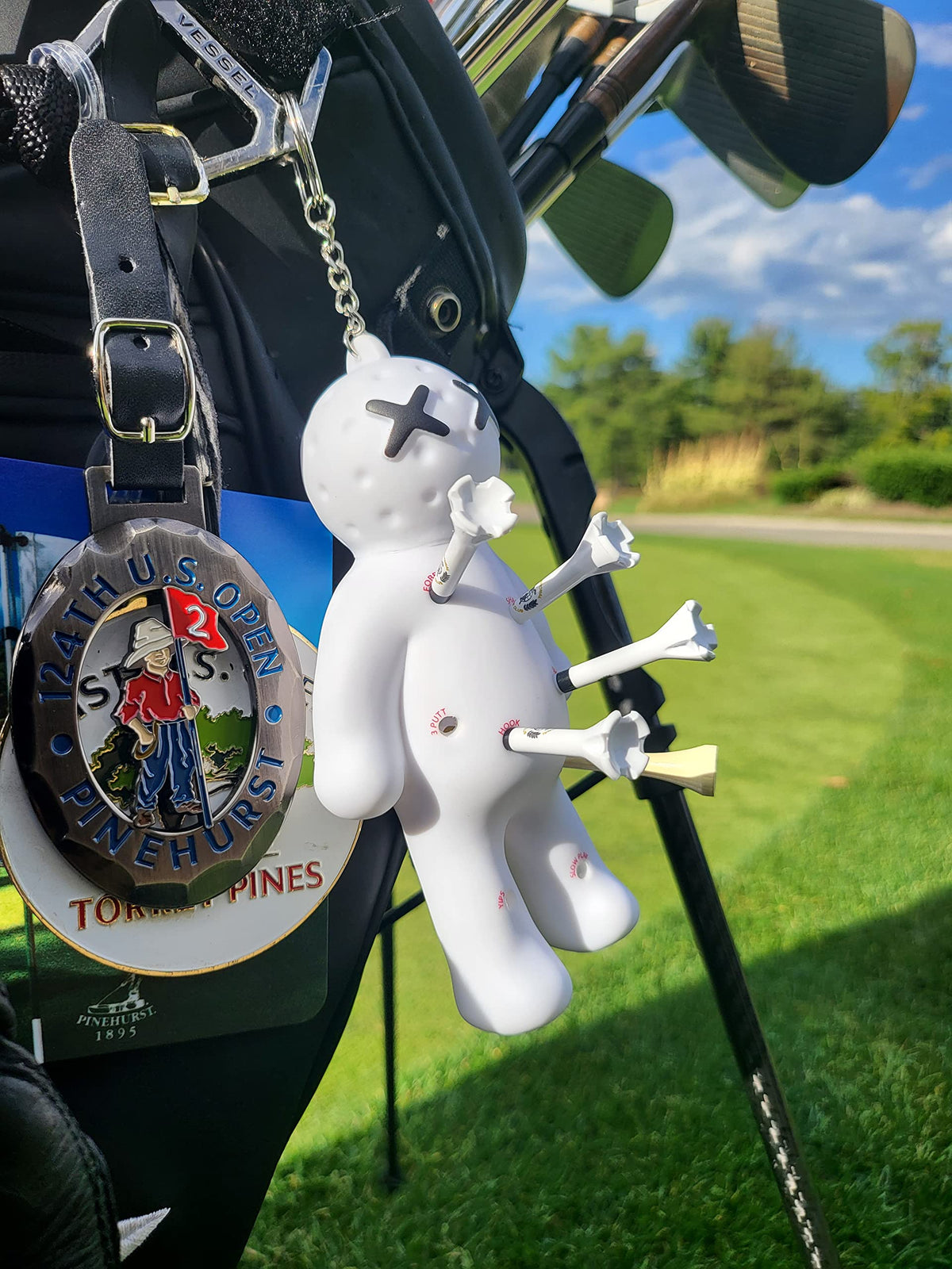 Voodoo Golf tee holder adds playful vibe on the bag.