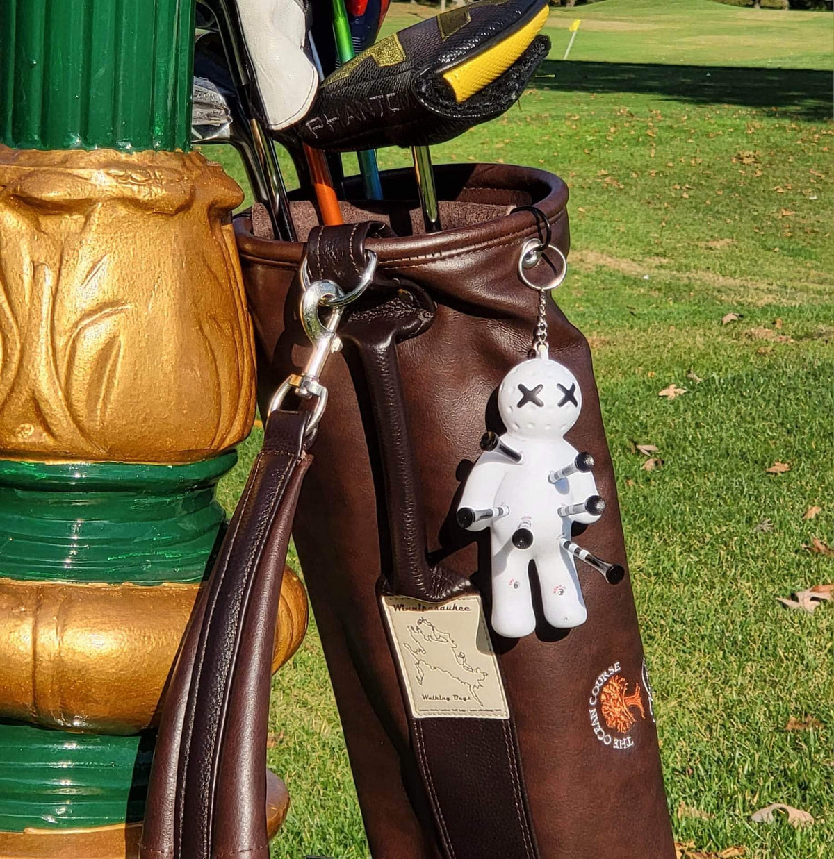 Voodoo Golf tee holder keeps up to eight tees accessible.