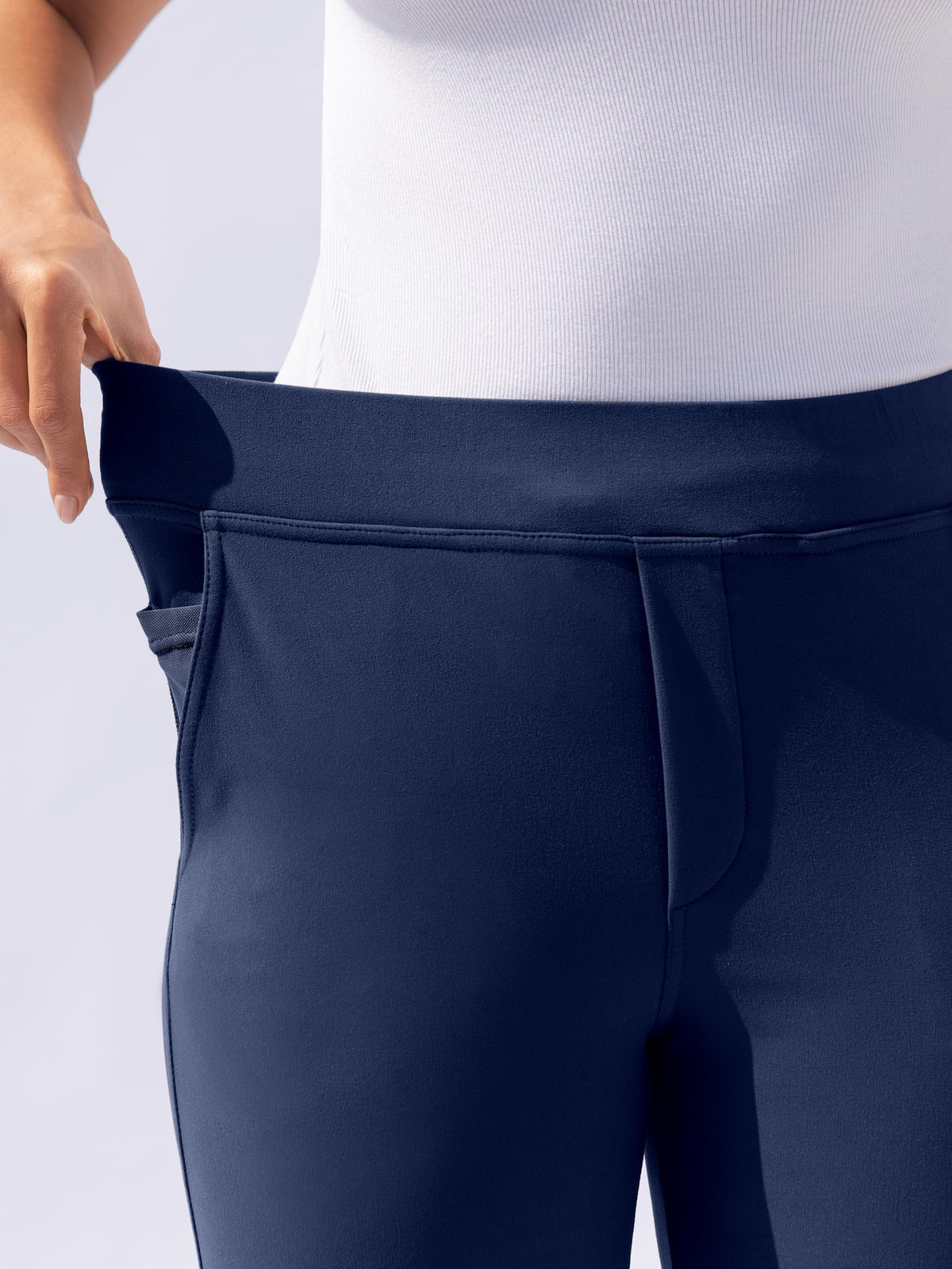 VOOVEEYA high-rise pants with tummy control for a flattering fit.