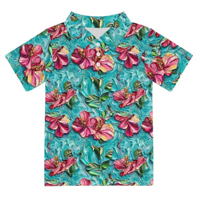 Warmkitty turquoise pink flowers polo shirt front view for sunny beach days