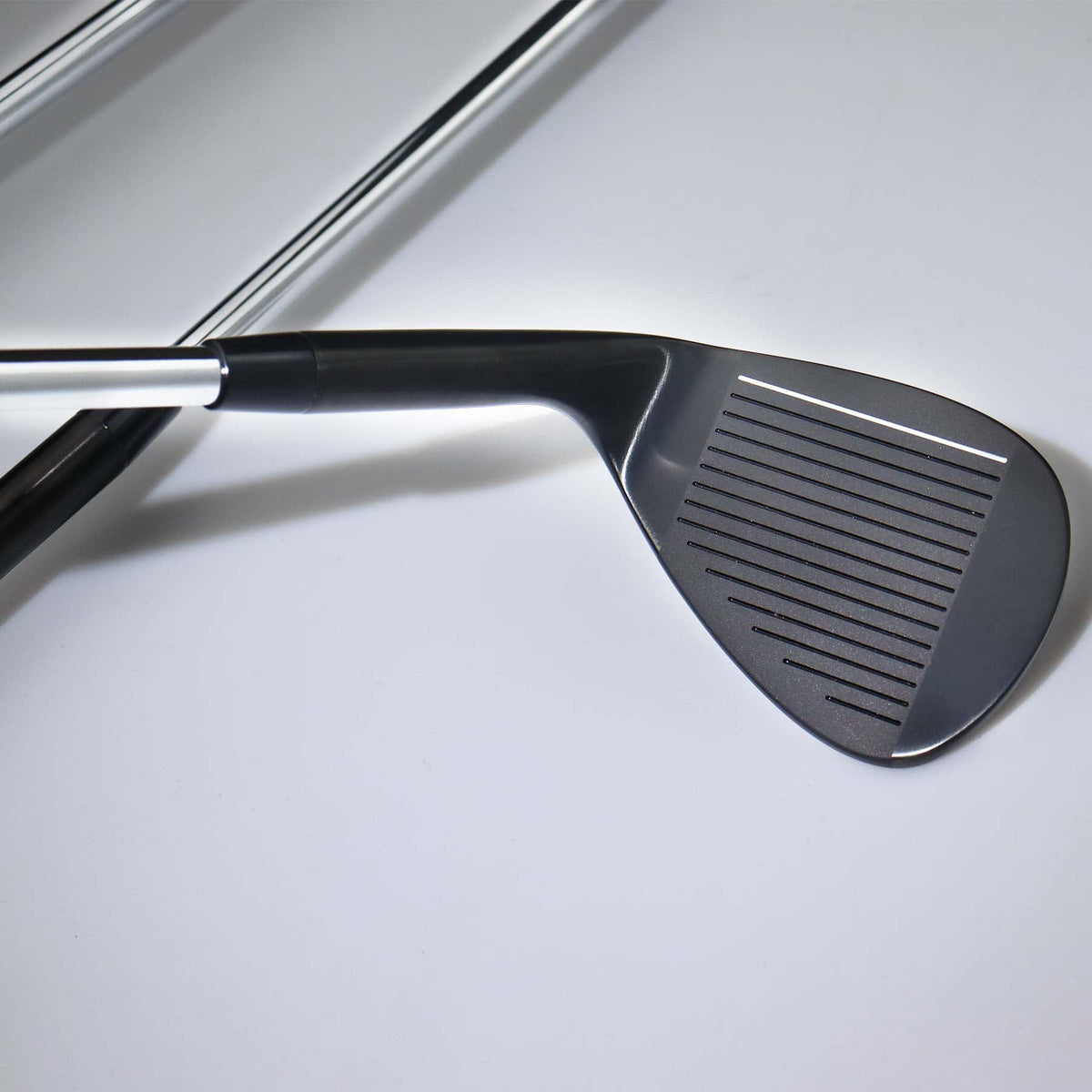 WENGH 56-degree sand wedge in black finish improving bunker bite.