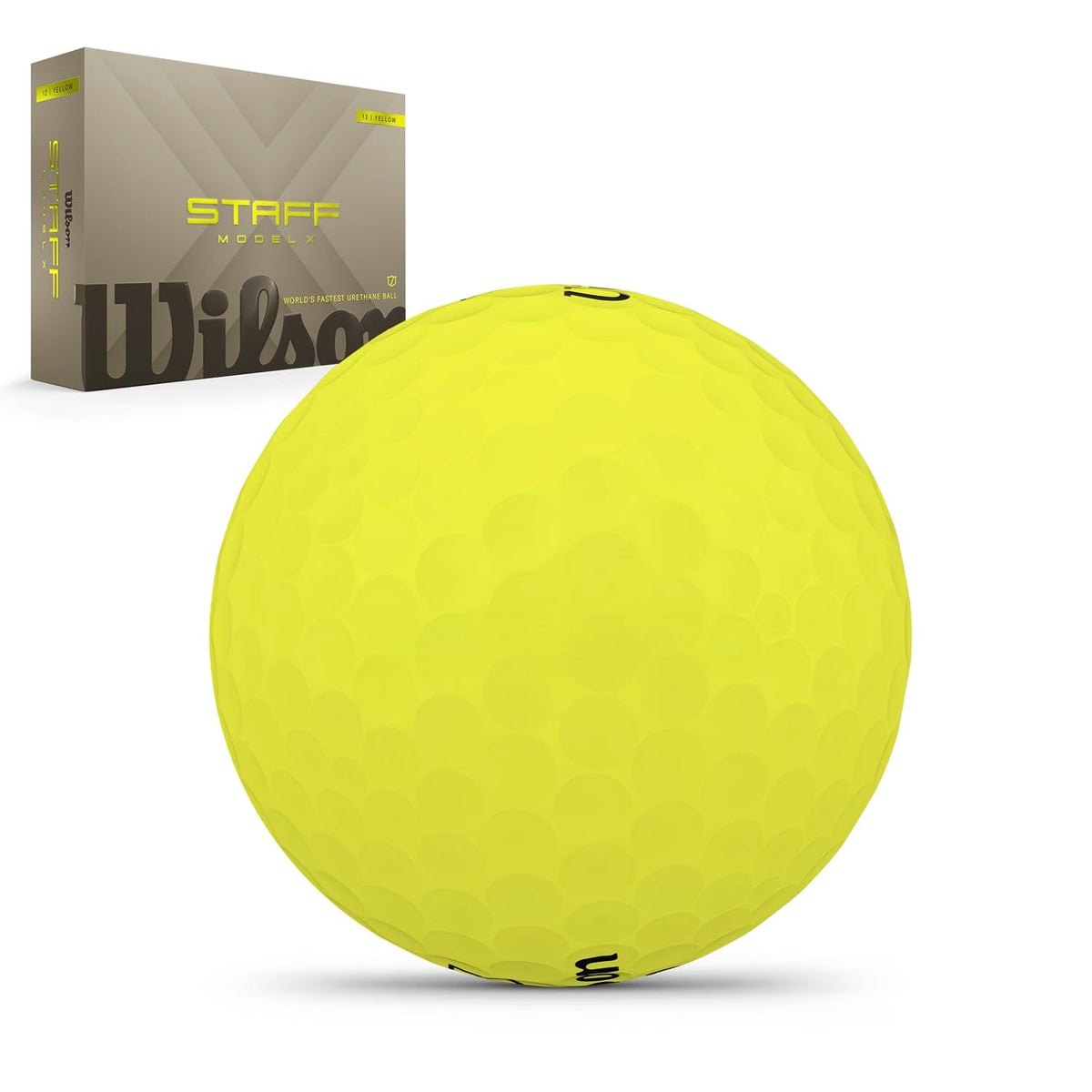 Wilson 2026 Staff Model X yellow ball on green, demonstrating distance potential with low spin