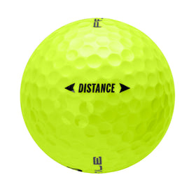 Wilson Profile Distance yellow balls beside a driver for practice rounds