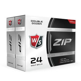 Wilson Staff Zip white golf ball on green, emphasizing visibility.