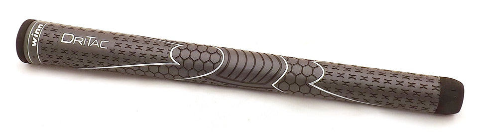 Winn Dri-Tac Oversize grip closeup showing tacky surface and shock absorption for all-weather play
