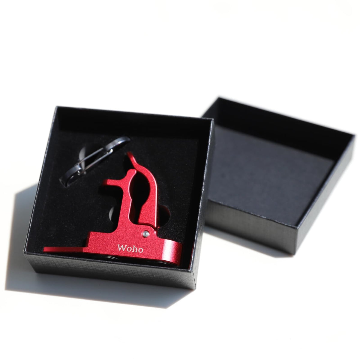 Woho golf accessory keeps tools and cigars within reach during play.