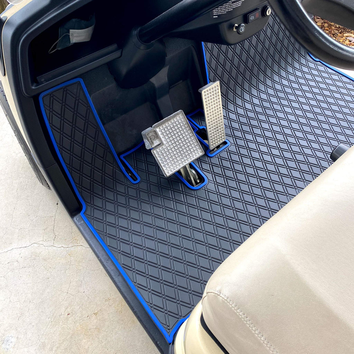 Xtreme Mats Drive Gen1 floor mat features a diamond pattern for grip.