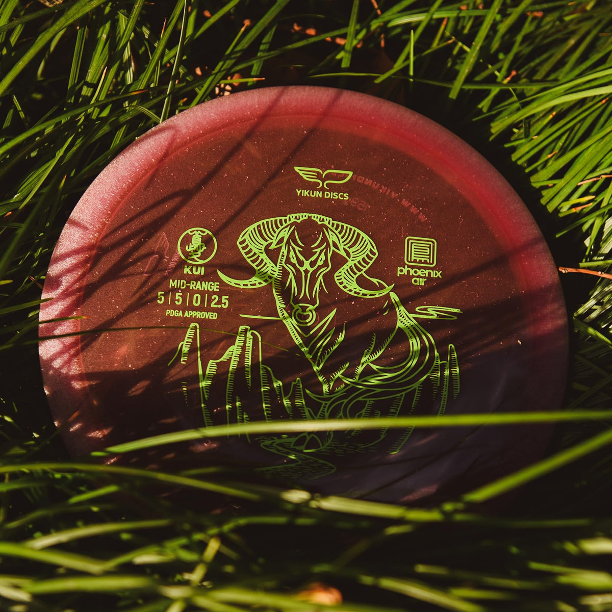 PDGA-certified Yikun Kui Midrange Disc label on the shell