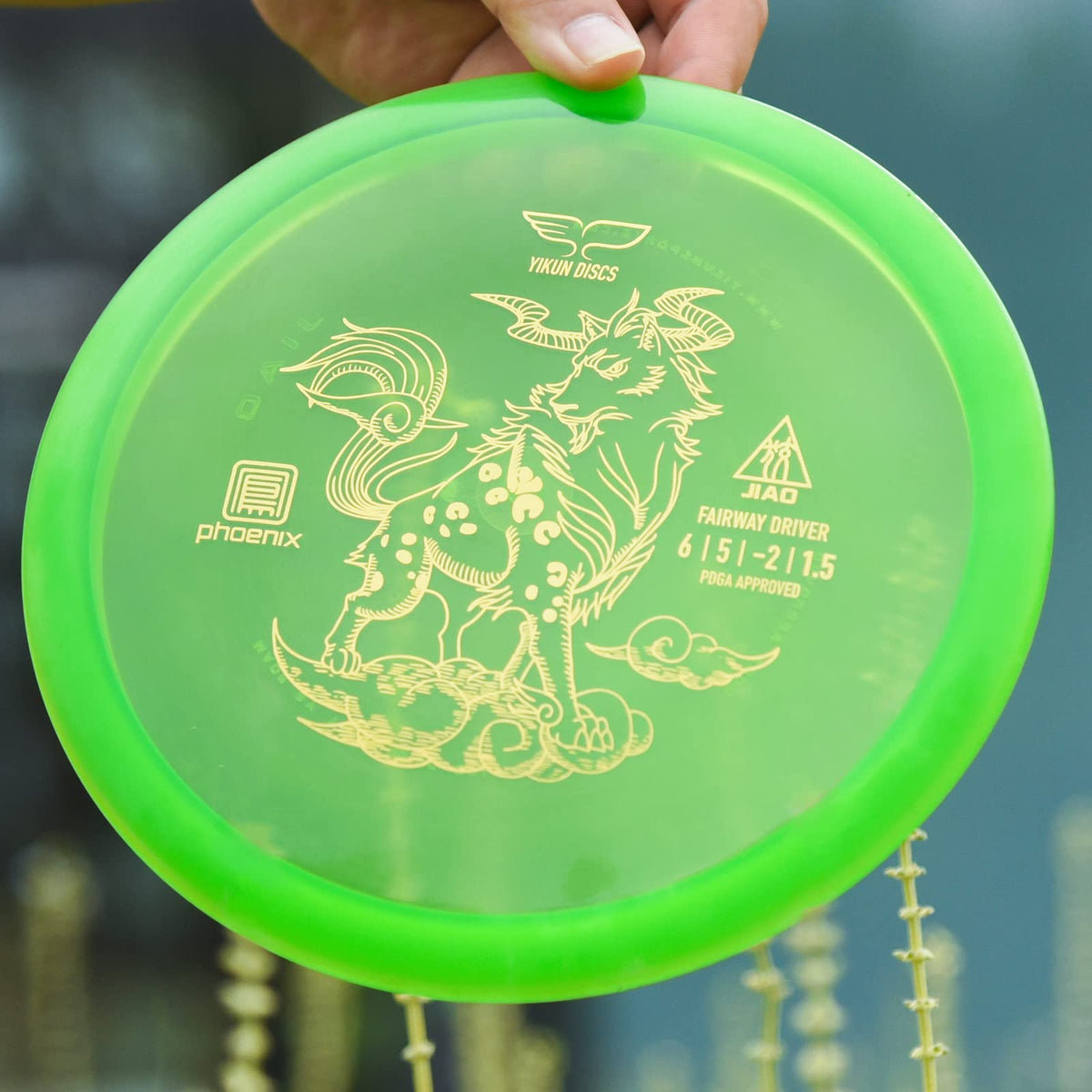 Yikundiscs disc golf driver on green in a competition-ready setup.