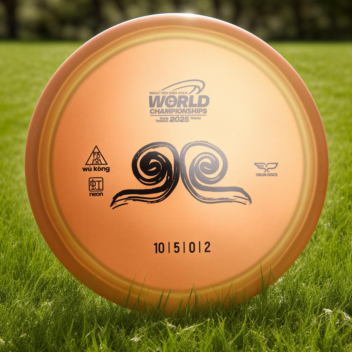 Yikundiscs orange Pro Worlds 2025 disc showcases dynamic branding artwork.