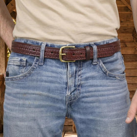 Yoder Leather basketweave bridle belt brass buckle detail in brown belt.