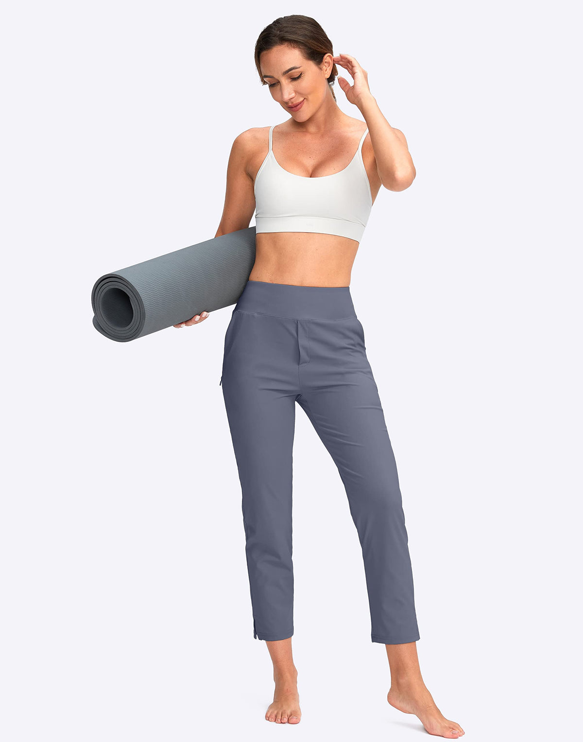 YYV women's golf pants with versatile pockets for on-the-go storage.