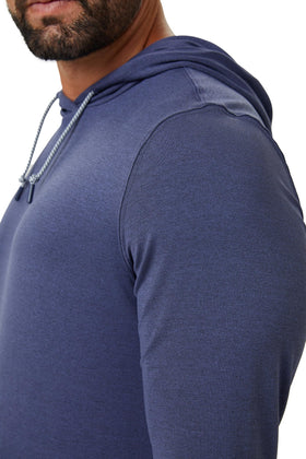 ZIRE Golf hoodie cuff stretch demonstrates four-way movement support.