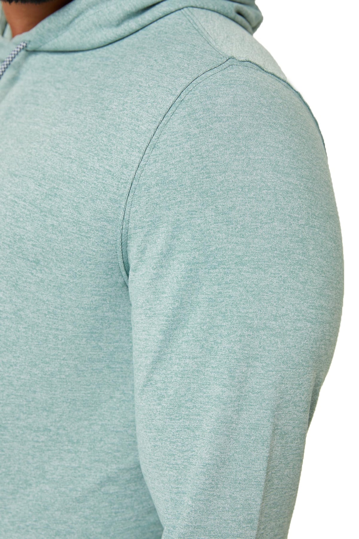 ZIRE Golf Men's Performance Hoodie fabric texture close-up emphasizing soft breathable polyester-spandex blend.
