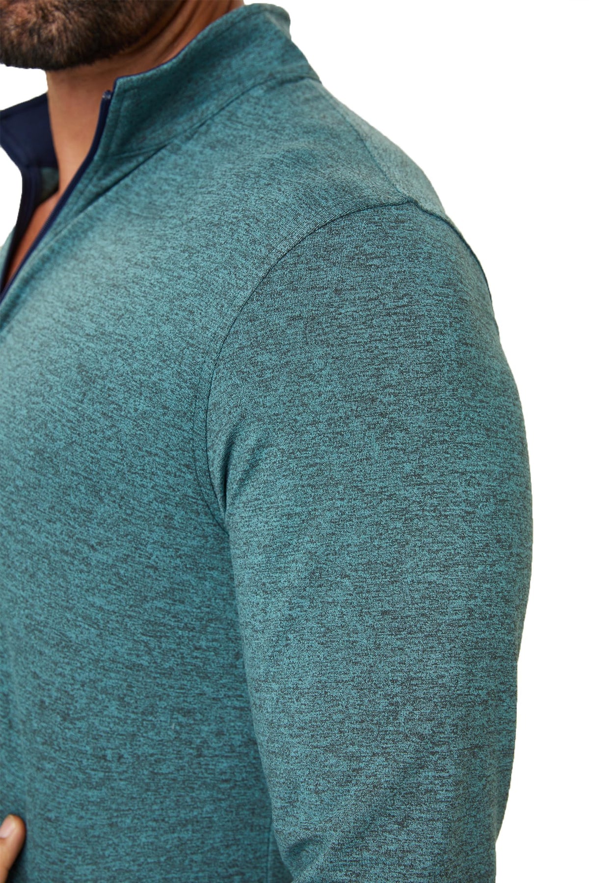 ZIRE Golf performance quarter zip pullover fabric texture close-up emphasizing soft tagless interior for irritation-free wear