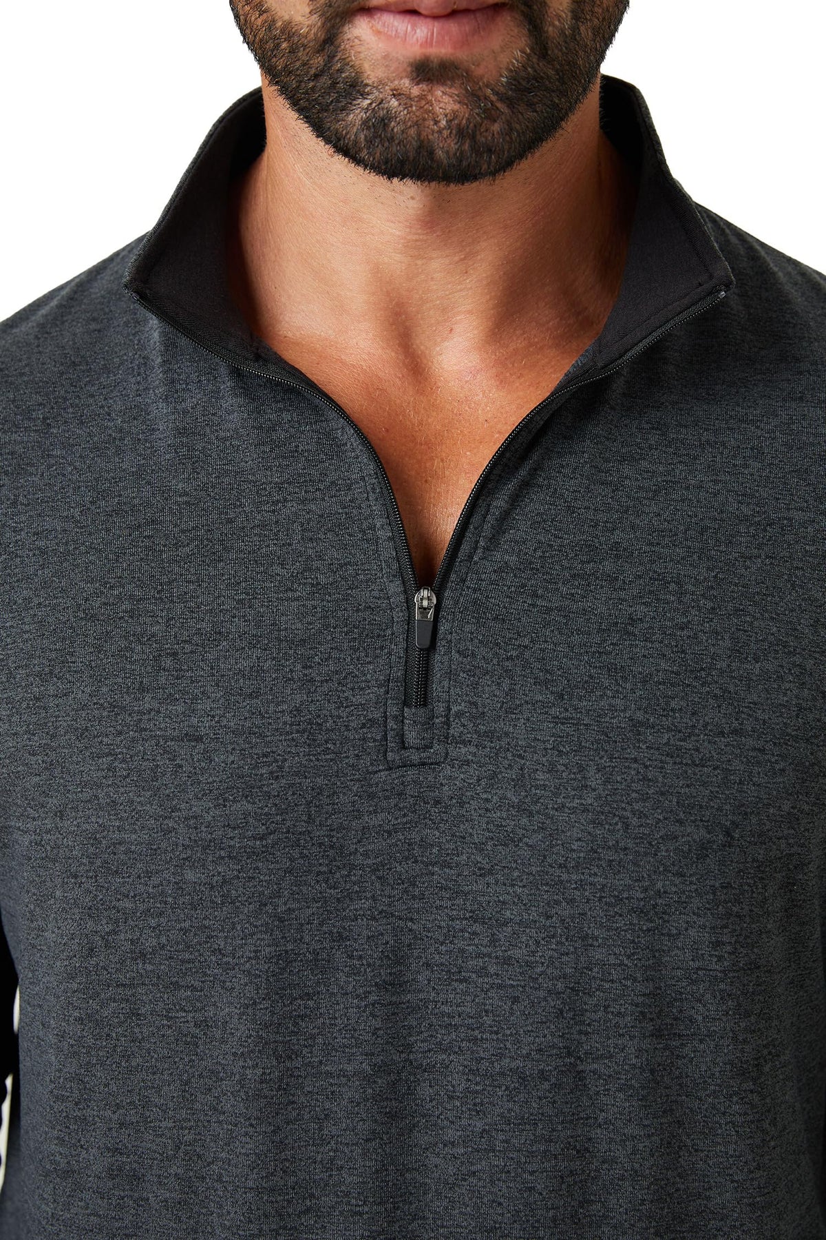 ZIRE Golf men's performance quarter zip pullover side seam; four-way stretch supports unrestricted movement.