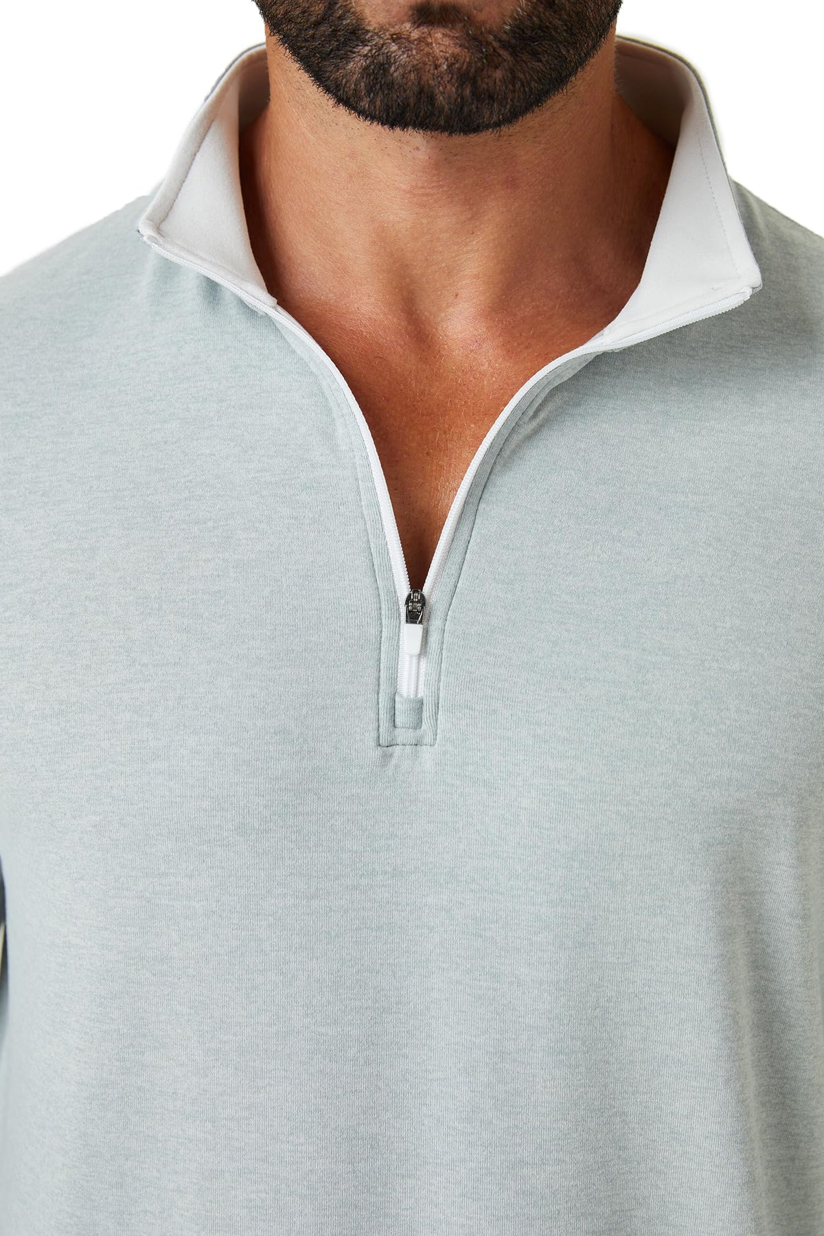 ZIRE Golf men's quarter zip pullover fabric detail, moisture-wicking and four-way stretch.