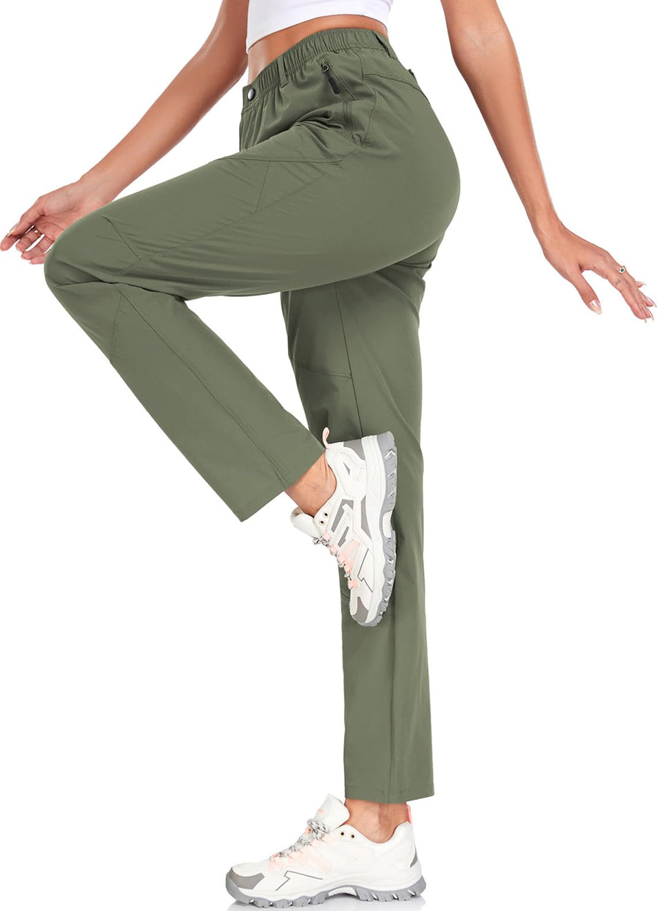 Zooxing women's golf pants in army green front view with zip pockets for secure travel storage.